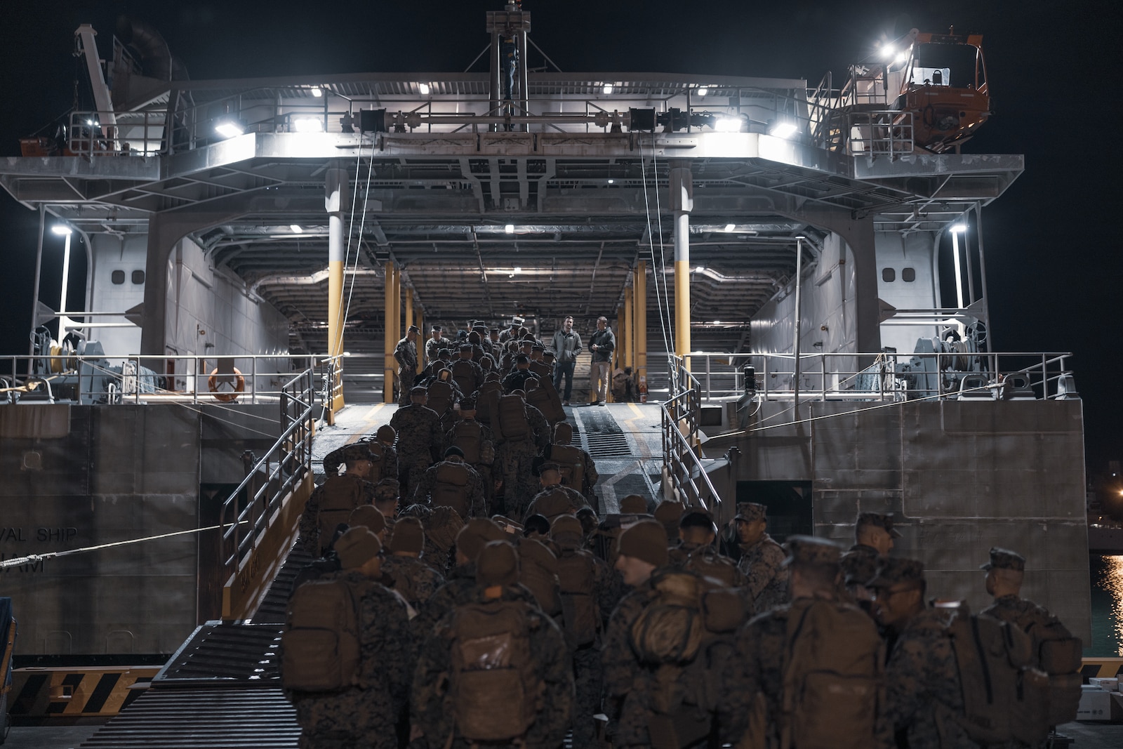 U.S. Marines with III Marine Expeditionary Force embark the high-speed transport vessel USNS Guam (T-HST 1) at Naha Military Port, Okinawa, Japan, March 3, 2023. The USNS Guam will transport Marines to the Republic of Korea for exercise Freedom Shield 23. Freedom Shield is a defense-oriented exercise designed to strengthen the ROK-U.S. Alliance, enhance our combined defense posture, and strengthen security and stability on the Korean peninsula. (U.S. Marine Corps photo by Lance Cpl. Tyler Andrews)