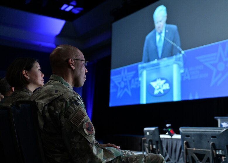 Air Force Chief of Staff Gen. CQ Brown, Jr. and Chief Master Sgt. of the Air Force JoAnne Bass listen to Secretary of the Air Force Frank Kendall deliver a keynote speech “One Team, One Fight” during the Air and Space Forces Association 2023 Warfare Symposium in Aurora, Colo., March 7, 2023. (U.S. Air Force photo by Eric Dietrich)