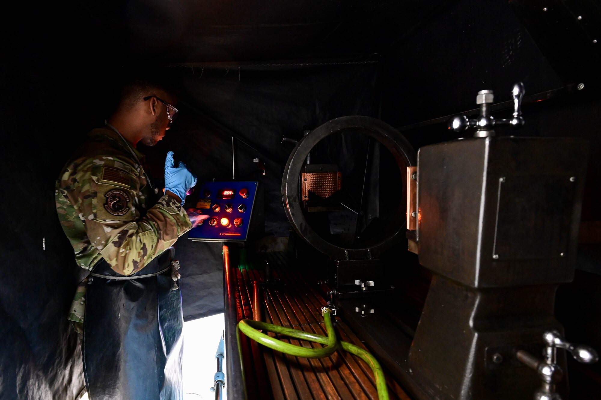 Airman 1st Class Jaylin Tripp, 8th Maintenance Squadron nondestructive inspection specialist, prepares to conduct magnetic particle inspection on aircraft equipment at Kunsan Air Base, Republic of Korea, Mar. 6, 2023.