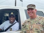 Photo of Tobyhanna's Sergeant Major (SGM) Michael J. Wiles posing with SGM (Retired) Kelvin Spencer.