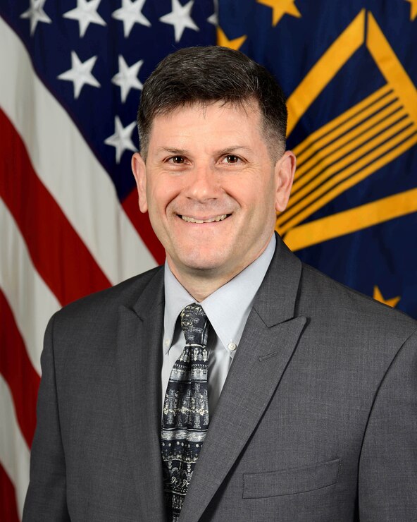 Curtis M. Masiello, Director, Planning, Performance and Assessment, Washington Headquarters Services, Department of Defense, poses for his official portrait in the Army portrait studio at the Pentagon in Arlington, Virginia, May 18, 2016.  (U.S. Army photo by Monica King/Released)