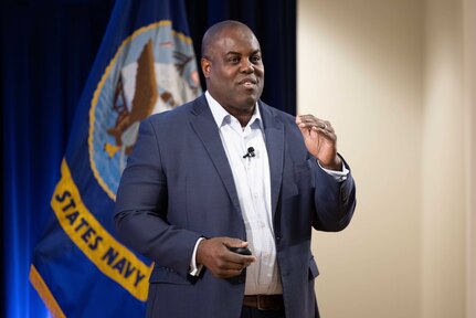 Former NFL Denver Bronco running back Reggie Rivers speaks as a guest speaker at Naval Surface Warfare Center, Carderock Division's 21st Century Workforce: A Leadership in a Diverse Environment Event (LDEE) in West Bethesda, Md., on March 1. (U.S. Navy photo by Devin Pisner)