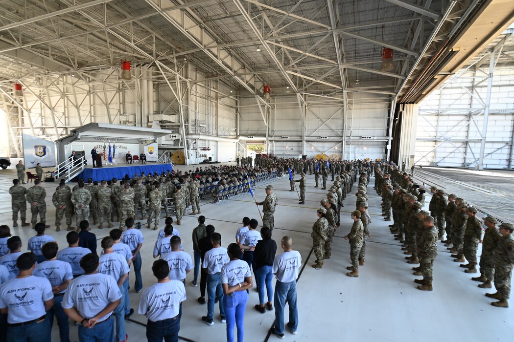 Reserve Citizen Airmen of the 433rd Airlift Wing look on as Col. William Gutermuth, 433rd AW commander, delivers remarks during a change of command ceremony March 5, 2023, at Joint Base San Antonio-Lackland, Texas. Brig. Gen. Derin Durham, 4th Air Force commander, presided over the ceremony. (U.S. Air Force photo by Master Sgt. Mike Lahrman)