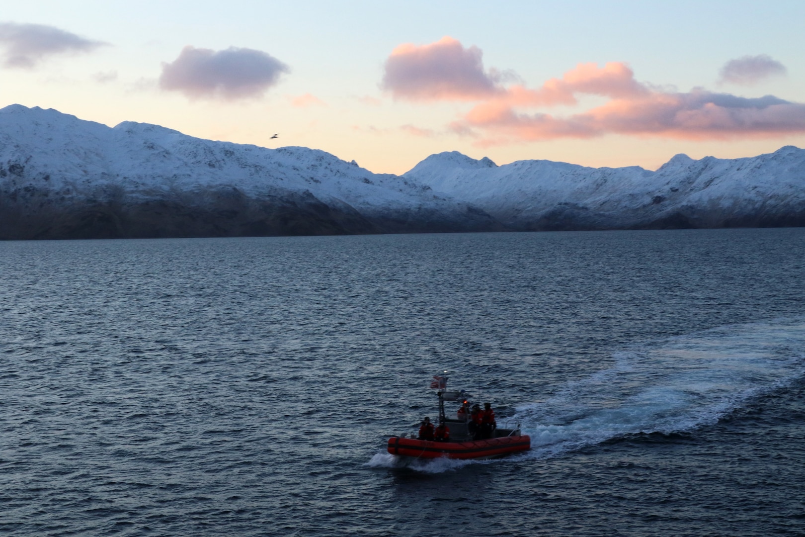 U.S. Coast Guard Cutter Munro (WMSL 755) crewmembers aboard a 26-foot over the horizon small boat is underway in the Bering Sea during an Alaska Patrol, Jan. 17, 2023. Munro partnered with NOAA Office of Law Enforcement personnel to conduct 24 boardings of commercial fishing vessels with the goal of enforcing sustainable fishing practices and ensuring compliance with federal regulations. U.S. Coast Guard courtesy photo.