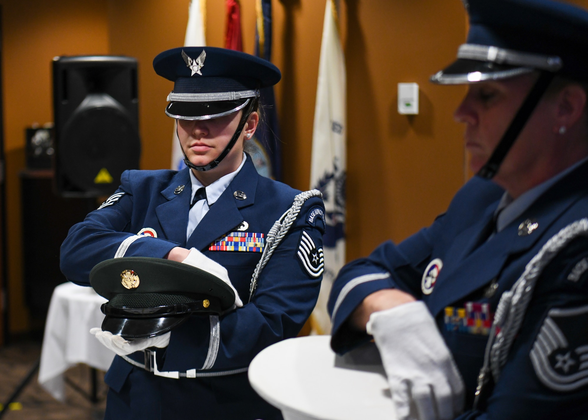 An all-female honor guard performs a POW/MIA missing man table ceremony during the 910th Airlift Wing’s annual awards banquet, March 4, 2023, at Youngstown Air Reserve Station, Ohio.