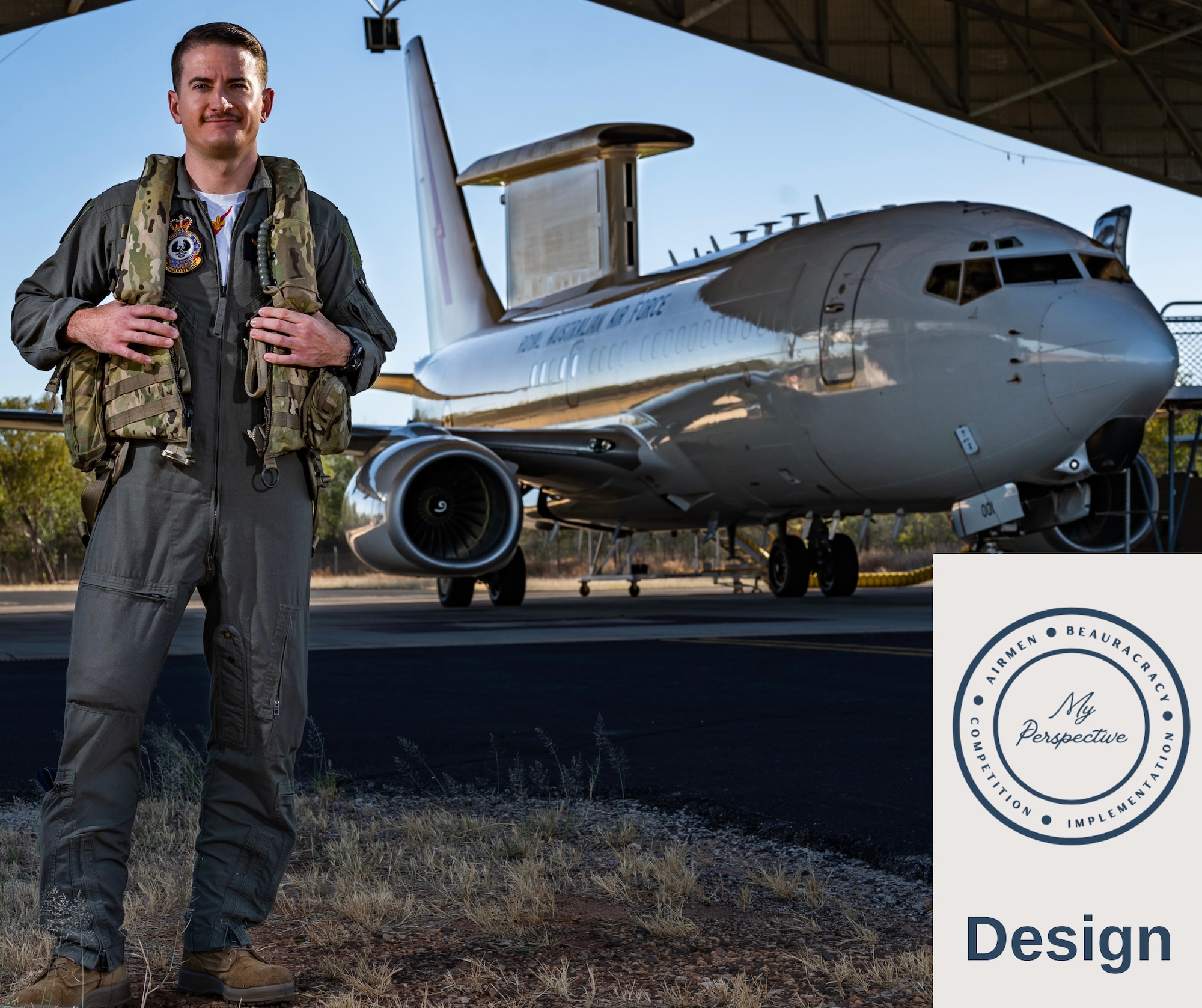 Airman standing in front E-7A Wedgetail aircraft