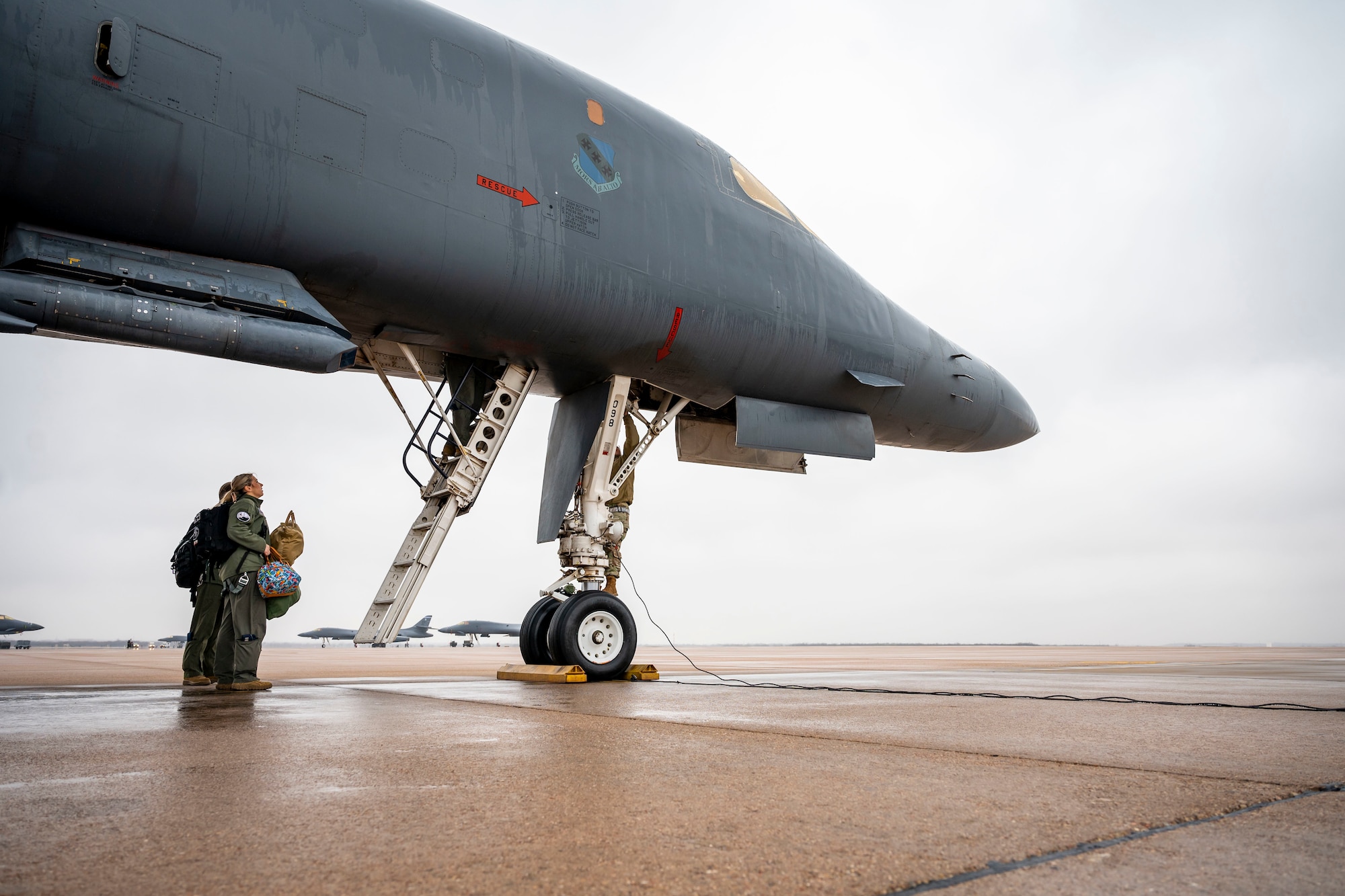 U.S. Air Force Airmen from the 28th and 9th Bomb Squadrons prepare a B-1B Lancer before takeoff during an all-female aircrew flight in honor of International Women's Day at Dyess Air Force Base, Texas, March 8, 2023. The world recognizes March as Women’s History Month and March 8 as International Women’s Day. The observance provided Dyess AFB an opportunity to support an all-female aircrew flight and highlight all the women contributing to the success and achievements within the military community. (U.S. Air Force photo by Senior Airman Leon Redfern)