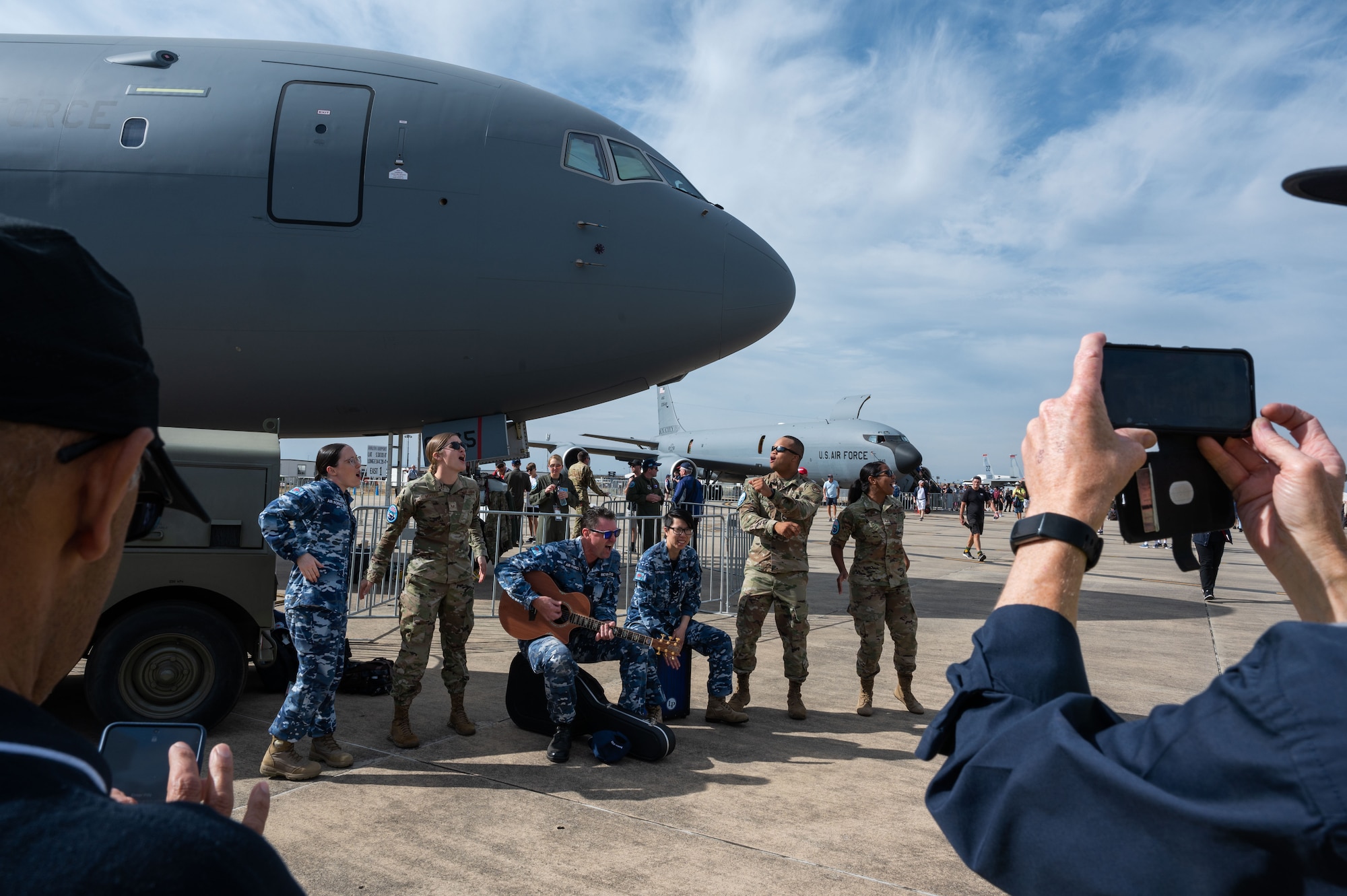 The U.S. Air Force Band of the Pacific-Hawaii performs a song in front of the KC-46 Pegasus static display at the 2023 Australian International Airshow and Aerospace & Defence Exposition—AVALON 23—at Avalon International Airport, March 4, 2023. Our steadfast relationship with Australia, deeply rooted in our common principles and shared values, stems from working together day in and day out across the full spectrum of operations and will continue to prosper as we further integrate our efforts through events such as AVALON 23. Through the power and energy of music, the Band of the Pacific’s impressive performances create engaging moments that serve as a demonstration of the excellence displayed by the 46,000 Airmen serving, stationed and deployed throughout the Indo-Pacific. (U.S. Air Force photo by Tech. Sgt. Hailey Haux)