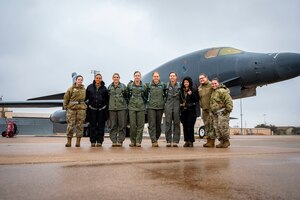 U.S. Air Force Airmen from the 28th and 9th Bomb Squadrons pose in front of a B-1B Lancer before takeoff during an all-female aircrew flight in honor of International Women's Day at Dyess Air Force Base, Texas, March 8, 2023. The world recognizes March as Women’s History Month and March 8 as International Women’s Day. The observance provided Dyess AFB an opportunity to support an all-female aircrew flight and highlight all the women contributing to the success and achievements within the military community. (U.S. Air Force photo by Senior Airman Leon Redfern)