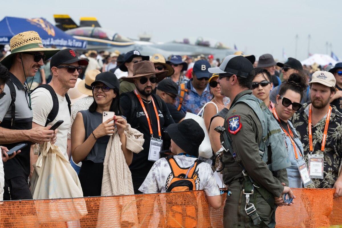 U.S. Air Force Maj. Joshua Gunderson, F-22 Raptor demo pilot, interacts with spectators after a demonstration at the 2023 Australian International Airshow and Aerospace & Defence Exposition—AVALON 23—at Avalon International Airport, March 4, 2023. Our steadfast relationship with Australia, deeply rooted in our common principles and shared values, stems from working together day in and day out across the full spectrum of operations and will continue to prosper as we further integrate our efforts through events such as AVALON 23. The F-22 is a combination of stealth, supercruise, maneuverability, and integrated avionics, coupled with improved supportability. (U.S. Air Force photo by Tech. Sgt. Hailey Haux)