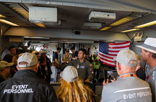 A U.S. Air Force KC-10 Extender pilot discusses the capabilities of the aircraft with event volunteers during the 2023 Australian International Airshow and Aerospace & Defence Exposition—AVALON 23—at Avalon International Airport, March 2, 2023. The Department of Defense supported AVALON 23 with approximately 300 personnel and a number of various aircraft to include the F-22 Raptor, KC-46 Pegasus, C-17 Globemaster III, AH-64 Apache, M142 HIMARS among many others. The KC-10 is an Air Mobility Command advanced tanker and cargo aircraft designed to provide increased global mobility for U.S. armed forces. (U.S. Air Force photo by Tech. Sgt. Hailey Haux)