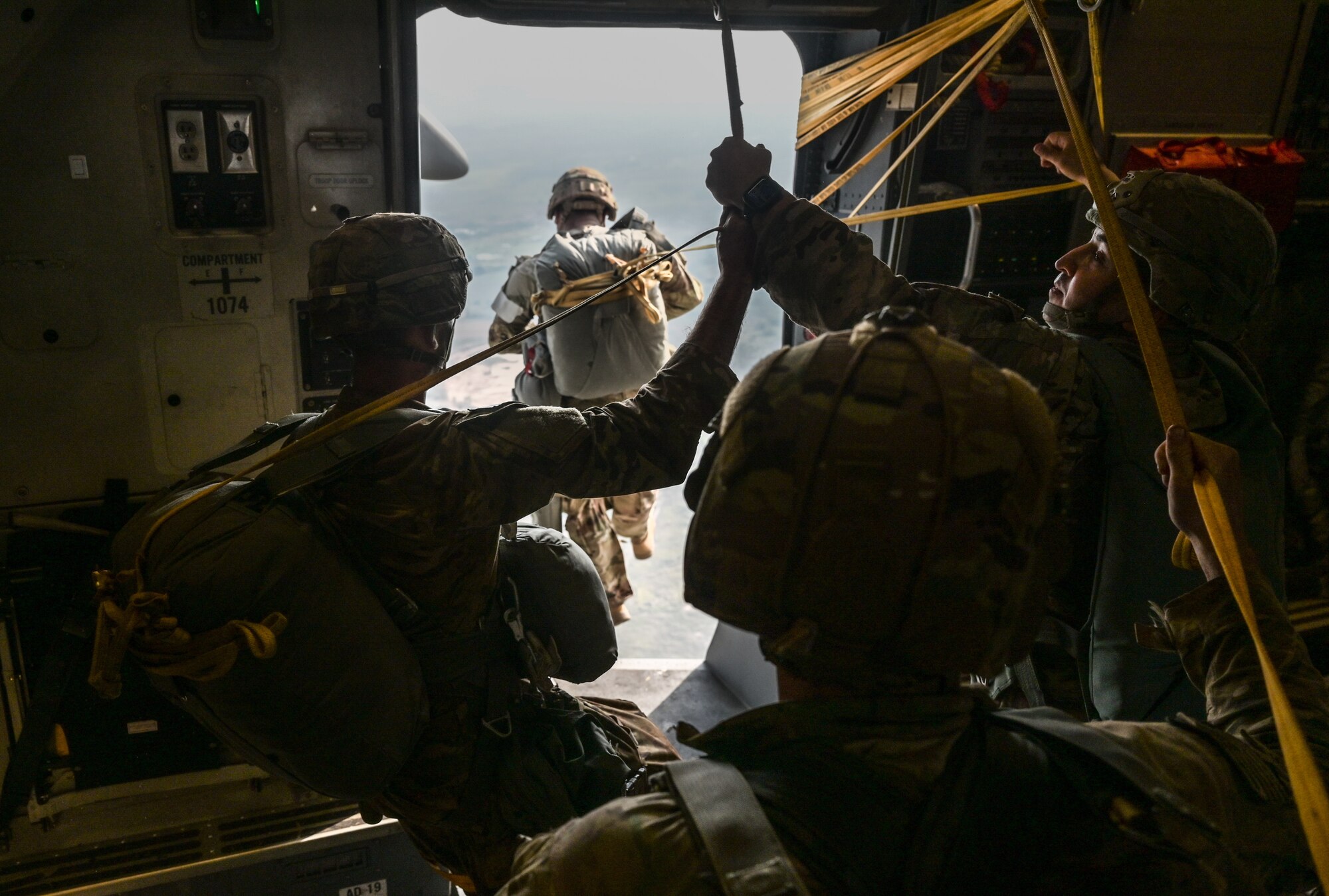 U.S. Army soldiers assigned to the 82nd Airborne Division jump from a U.S. Air Force C-17 Globemaster III during Exercise Cobra Gold 2023 over the skies of the Kingdom of Thailand, Mar. 3, 2023. Cobra Gold, now in its 42nd year, is a Thai-U.S. co-sponsored training event that builds on the long-standing friendship between the two allied nations and brings together a robust multinational force to promote regional peace and security in support of a free and open Indo-Pacific. (U.S. Air Force photo by Staff Sgt. Alan Ricker)