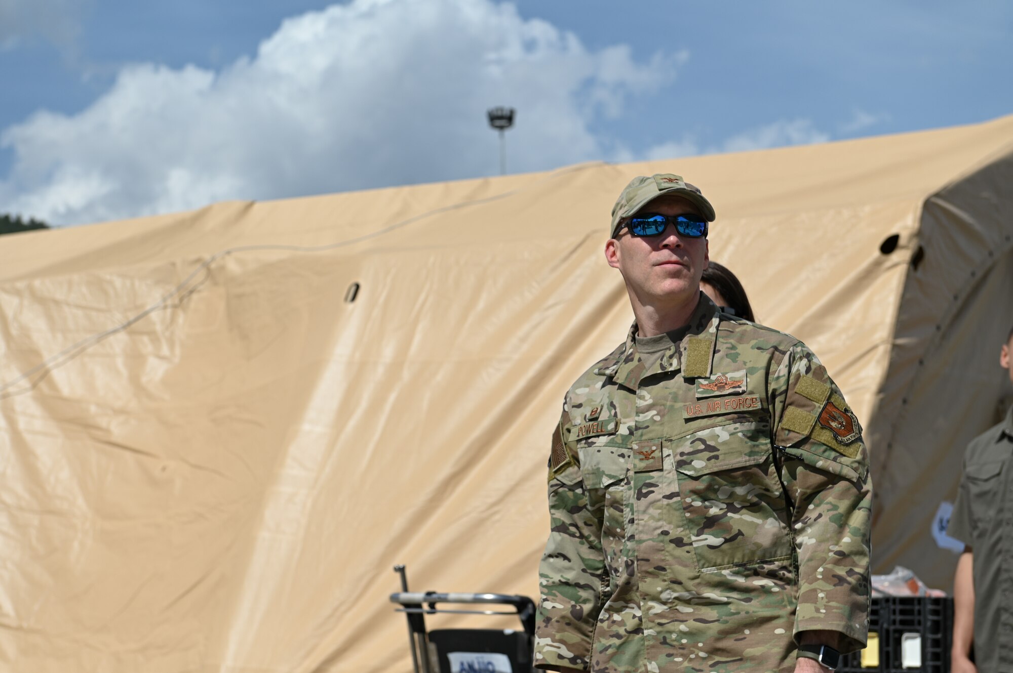 U.S. Air Force Col. Calvin Powell, 39th Air Base Wing commander, prepares for the arrival of U.S. Ambassador Jeffry Flake at field hospital on the grounds of the Mustafa Kemal University in Serinyol, Hatay, Türkiye, March 7, 2023.