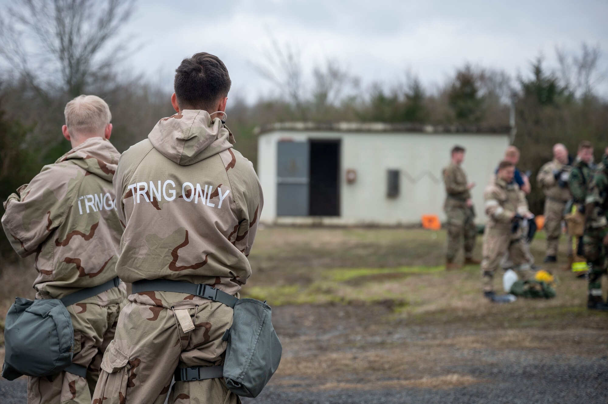 Military personnel await training