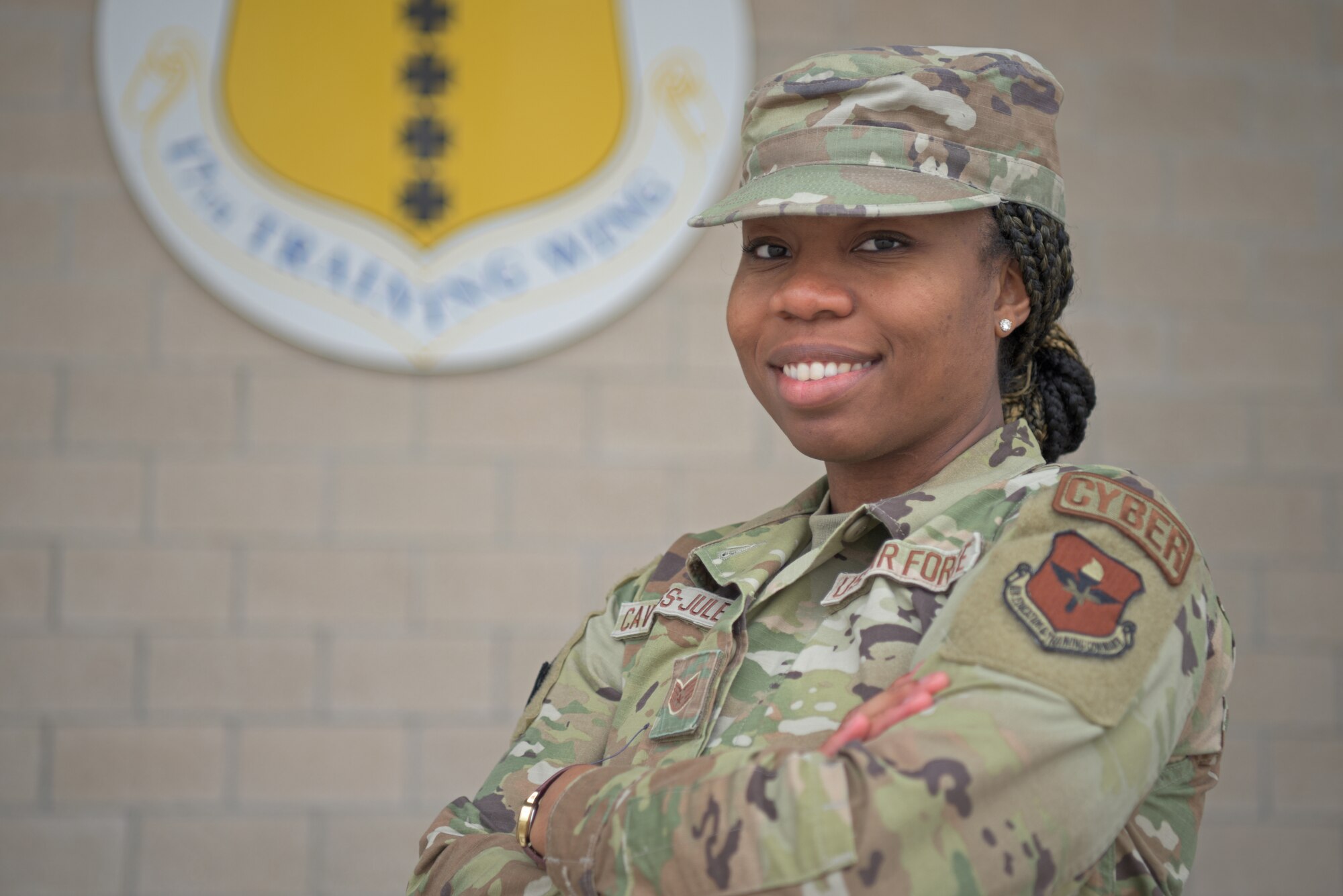 U.S. Air Force Staff Sgt. Crystyle Caviness-Jules, 17th Communications Squadron project manager, poses for a photo at Goodfellow Air Force Base, March 8, 2023. Caviness sees projects through from start to finish to modernize base infrastructure. (U.S. Air Force photo by Senior Airman Ashley Thrash)