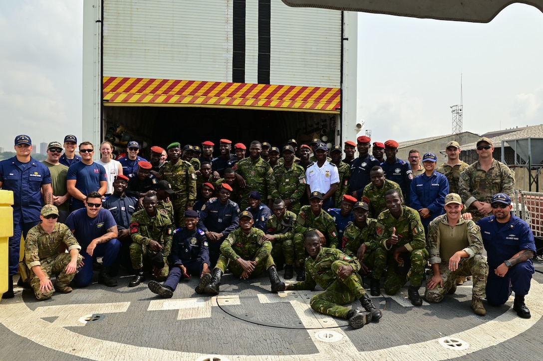 U.S. Coast Guard law enforcement personnel and crew assigned to USCGC Spencer (WMEC 905) pose for a group photo after conducting boarding procedure training with members of the Ivorian Navy and Gendarmerie in Abidjan, Côte d’Ivoire, Feb. 17, 2023. Spencer is on a scheduled deployment in the U.S. Naval Forces Africa area of responsibility, employed by the U.S. Sixth Fleet, to carry out joint training, exercises, and maritime security operations alongside African partners in support of U.S. interests abroad, regional partnerships, and to strengthen international maritime governance. (U.S. Coast Guard photo by Petty Officer 3rd Class Mikaela McGee)