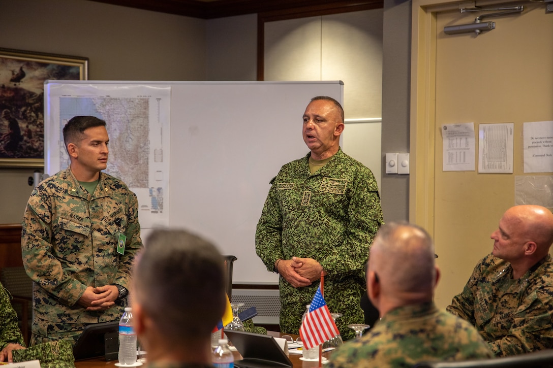Brig. Gen. Jorge Federico Torres Mora, commandant of the Colombian Marine Corps, speaks about joint military opportunities during a command brief at Marine Corps Support Facility New Orleans, Feb. 28, 2023. During the brief, Colombian Marines and U.S. Marines discussed key engagements to strengthen partnerships, interoperability, and naval integration. Torres, and the Colombian delegation, traveled to various locations within the United States to conduct key leadership engagements aimed at advancing institutional knowledge and processes. These engagements are critical elements to maintaining interoperability and to continue to strengthen the partnership between the two marine corps.