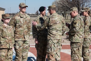Airmen receive patches during ceremony