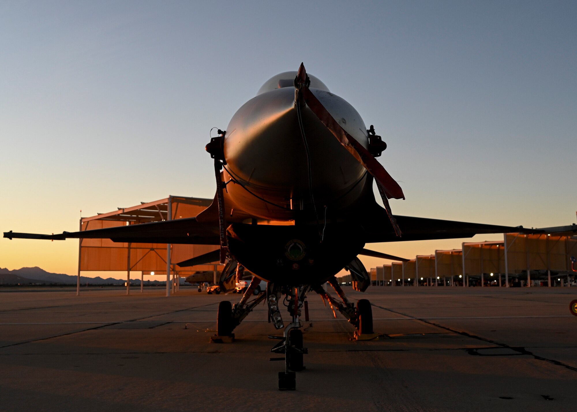 A photo of an aircraft parked on a flightline.