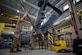 U.S. Air Force students assigned to the 362d Training Squadron, Detachment 1, HH-60W helicopter repair course, replace the center stabilator box on a HH-60W Jolly Green II Combat Rescue Helicopter simulator at Joint Base Langley-Eustis, Virginia, Feb. 21, 2023. The new course started Jan. 16, and will prepare about 90 students with the 2A5X2 Air Force Specialty Code per year. (U.S. Air Force photo by Staff Sgt. Anthony Nin Leclerec)