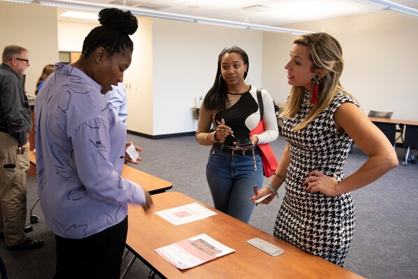 Dellaria Martin (Left), U.S. Army Corps of Engineers Nashville District contracting officer, answers questions and provides information to Allie Williamson (Right), chief executive diva for Southern Domestic Diva, and Laina Kimbro, sales executive assistant, during the U.S. Army Corps of Engineers Nashville District’s Small Business Industry Day March 6, 2023, at Tennessee State University in Nashville, Tennessee. (USACE Photo by Lee Roberts)