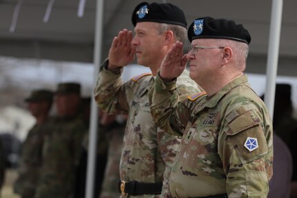 Lt. Gen. John S. Kolasheski, V Corps commanding general, and Maj. Gen. Timothy N. Thombleson, deputy commanding general of support, salute during the National Anthem at Thombleson’s welcome ceremony in Fort Knox, Kentucky, March 9, 2023. Prior to coming to V Corps Thombleson served as the 38th Infantry Division Commanding General from January 2021 to January 2023. (U.S. Army photo by Cpl Javen Owens