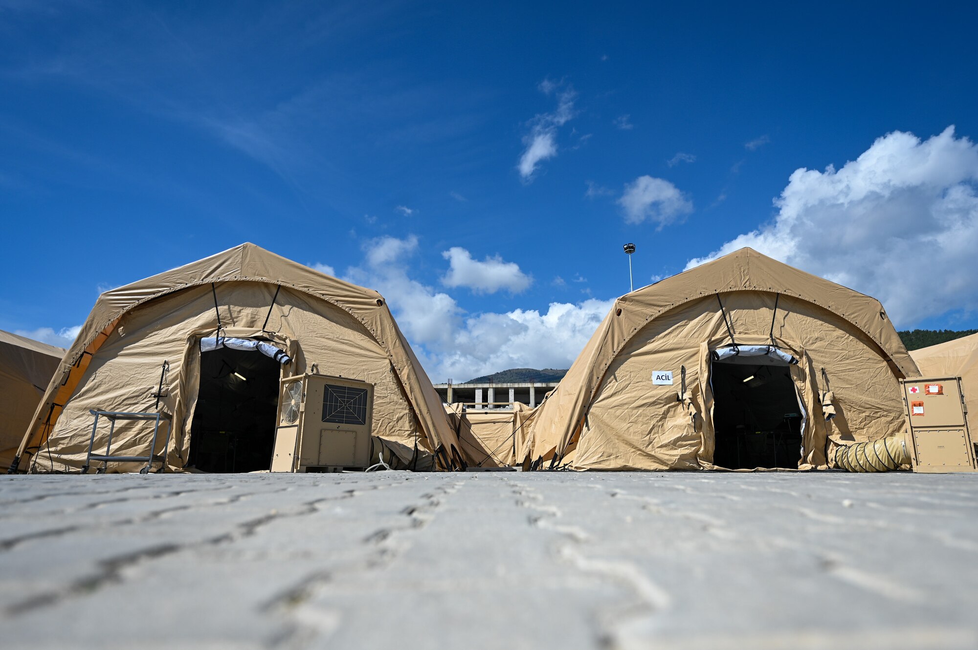 The temporary field hospital on the grounds of Mustafa Kemal University consists of medical tents in Serinyol, Hatay, Türkiye, March 7, 2023.