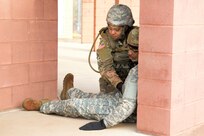 A U.S. Soldier provides first aid to a simulated casualty during an exercise at the Combined Arms Collective Training Facility at Fort Indiantown Gap, March 3, 2023. This exercise included responding to the scene of a mass casualty event, providing first aid and evacuating the simulated casualties to a field hospital where they received further care, all while being assessed by instructors with the Pennsylvania National Guard’s 4th Battalion, 166th Regiment Regional Training Institute (Medical Battalion Training Site). (U.S. Army National Guard photo by Maj. Travis Mueller)