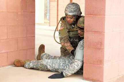 A U.S. Soldier provides first aid to a simulated casualty during an exercise at the Combined Arms Collective Training Facility at Fort Indiantown Gap, March 3, 2023. This exercise included responding to the scene of a mass casualty event, providing first aid and evacuating the simulated casualties to a field hospital where they received further care, all while being assessed by instructors with the Pennsylvania National Guard’s 4th Battalion, 166th Regiment Regional Training Institute (Medical Battalion Training Site). (U.S. Army National Guard photo by Maj. Travis Mueller)