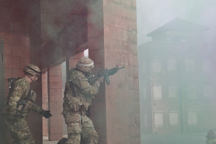 A U.S. Soldier provides security to a team of combat medic trainees responding to a simulated mass casualty event at the Combined Arms Collective Training Facility at Fort Indiantown Gap, March 3, 2023. This exercise included responding to the scene of the event, providing first aid and evacuating the simulated casualties to a field hospital where they received further care, all while being assessed by instructors with the Pennsylvania National Guard’s 4th Battalion, 166th Regiment Regional Training Institute (Medical Battalion Training Site). (U.S. Army National Guard photo by Maj. Travis Mueller)