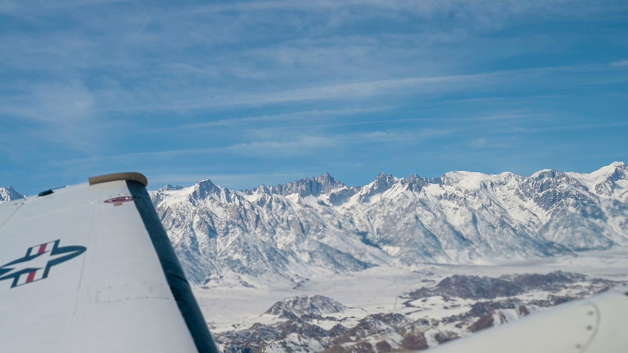 Mount Whitney, the highest mountain in the contiguous United States, can be seen during the Sidewinder low level flight survey through the Southern California wilderness.
