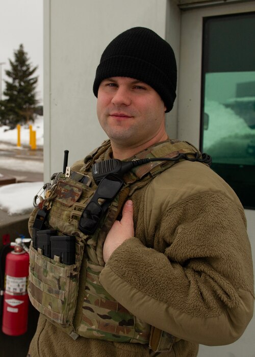 Tech Sgt. Jacob Larson, 934th Security Forces Squadron assistant flight sergeant, poses for a picture at Minneapolis-St. Paul Air Reserve Station on Feb. 27, 2023. Larson and other SFS defenders stopped a gate runner from entering the base in Jan. 2022.