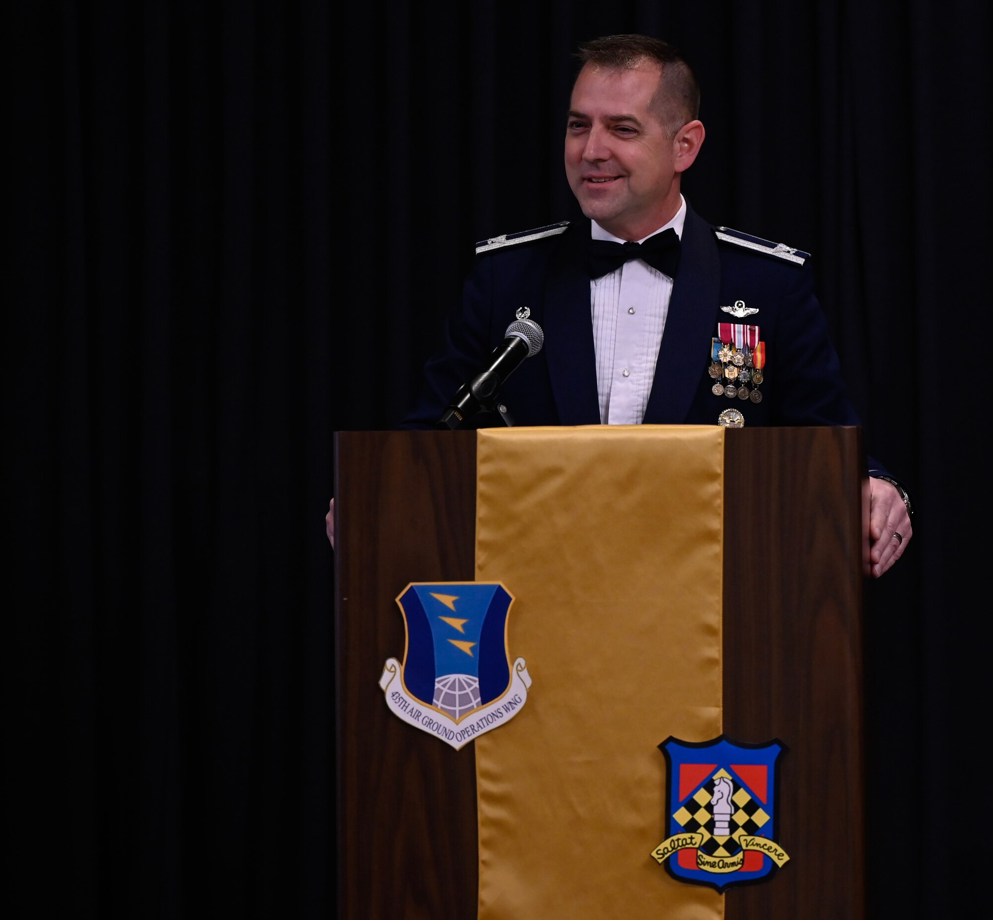 U.S. Air Force Col. Bryan T. Callahan, 435th Air Ground Operations Wing commander, provides opening remarks during the wing’s annual awards ceremony at Ramstein Air Base, Germany, March 4, 2023. The awards ceremony also doubled as the wing’s 80th Anniversary celebration.