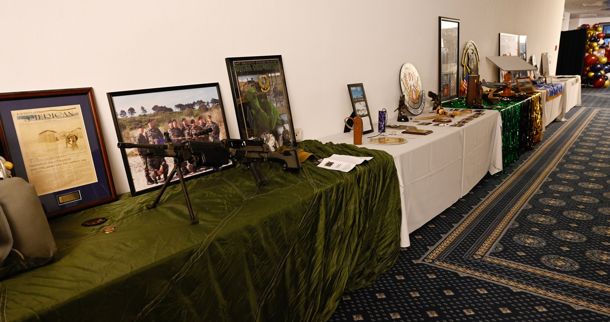 The 435th Air Ground Operations Wing displays their unit’s memorabilia during their 80th Anniversary celebration at Ramstein Air Base, Germany, March 4, 2023. In conjunction with the anniversary, the wing also announced their annual award winners.