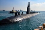 Tugboats assist the Los Angeles-class fast-attack submarine USS Springfield (SSN 761) as it pulls into port in Busan, Feb. 23. Springfield is one of four Los Angeles-class fast-attack submarines forward deployed to the island of Guam and assigned to Commander, Submarine Squadron (CSS) 15. CSS-15 is responsible for providing training, material and personnel readiness support to multiple Los Angeles-class fast-attack submarines and is located at Polaris Point, Naval Base Guam. (U.S. Navy photo by Mass Communication Specialist 2nd Class Adam Craft)