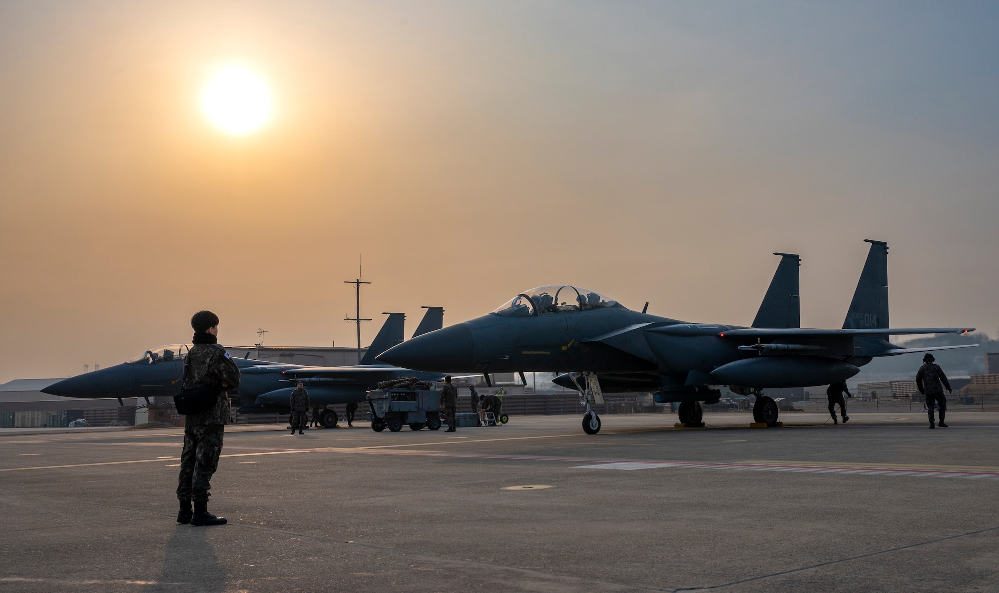 Republic of Korea Air Force Airmen assigned to the 102nd Fighter Squadron, prepare to launch F-15K Slam Eagles during Buddy Squadron 23-2 at Osan Air Base, Republic of Korea, March 8, 2023.