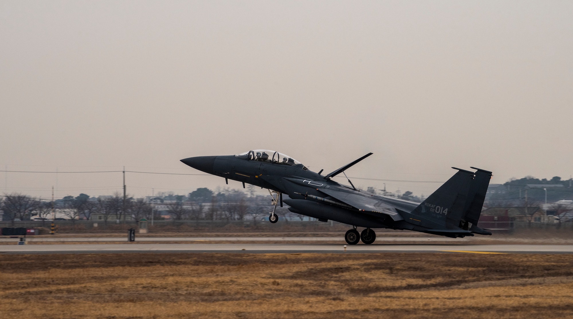 A Republic of Korea F-15K Slam Eagles assigned to the 102nd Fighter Squadron lands after flying a training mission during Buddy Squadron 23-2 at Osan Air Base, Republic of Korea, March 8, 2023.