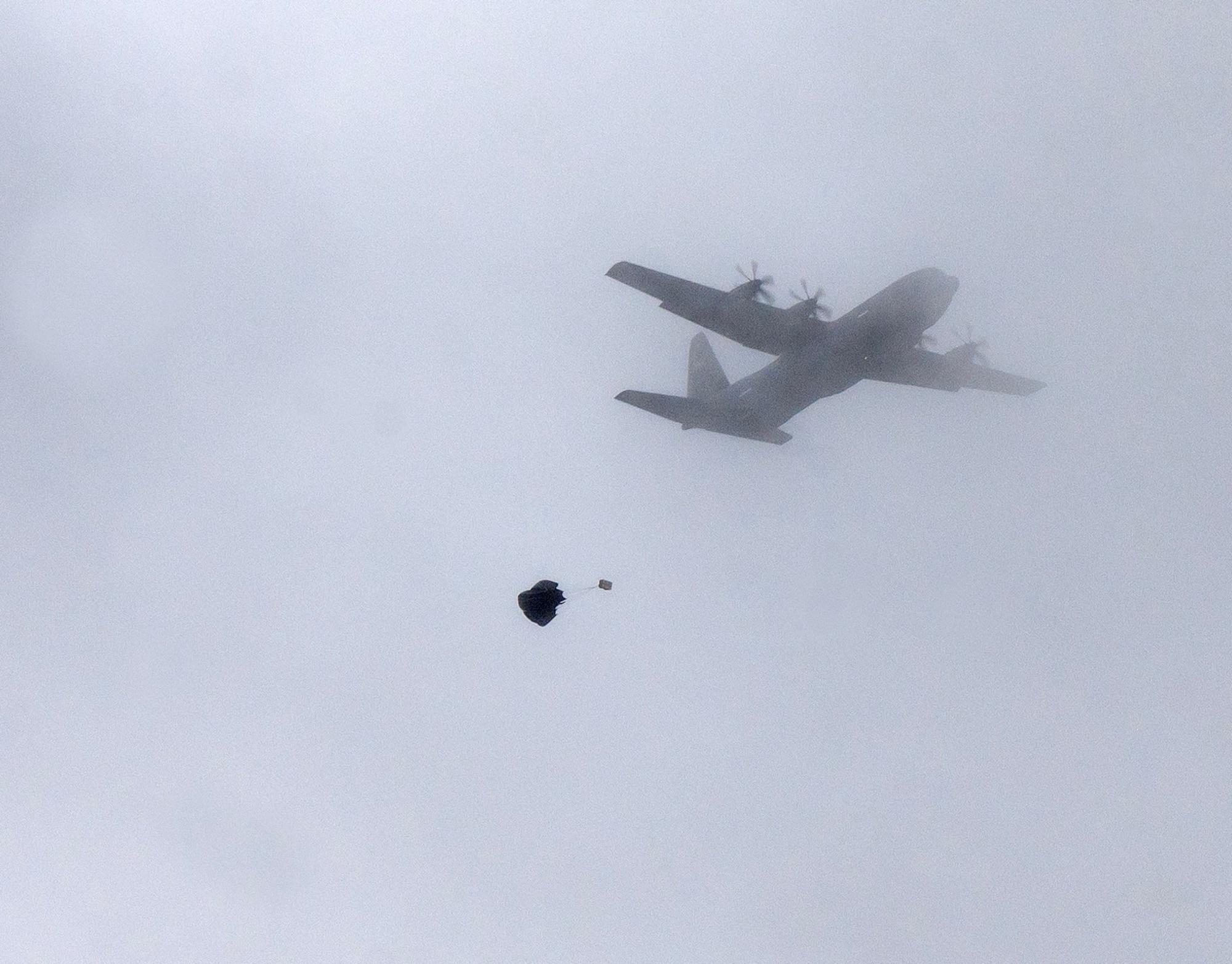 Cargo drops from a C-130J Super Hercules cargo aircraft assigned to Ramstein Air Base, Germany, at Chièvres Air Base, Belgium, during Exercise Agile Bison, March 8, 2023.