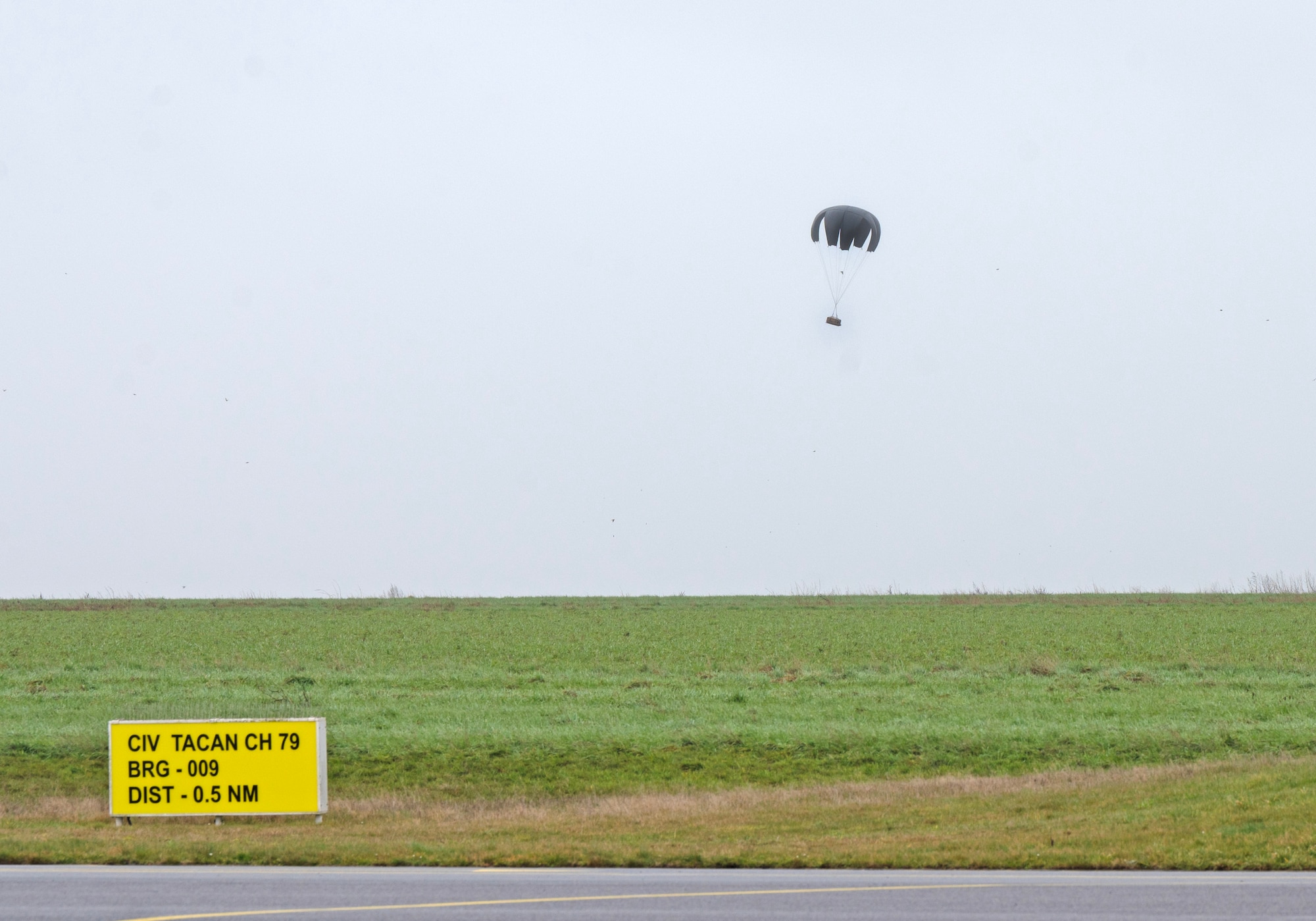 Cargo is dropped from a C-130J Super Hercules cargo aircraft assigned to Ramstein Air Base, Germany, during Exercise Agile Bison at Chièvres Air Base, Belgium, March 9, 2023.