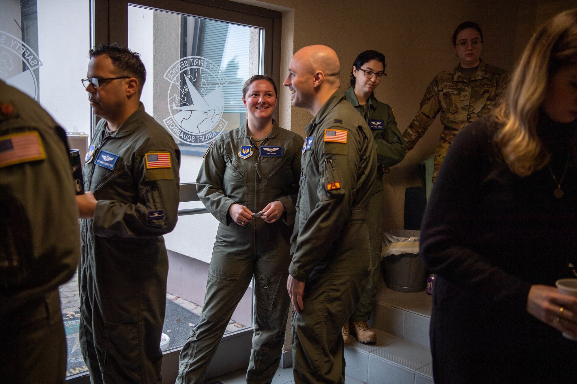 Members from the 76th Airlift Squadron line up to get breakfast at Ramstein Air Base, March 6, 2023.