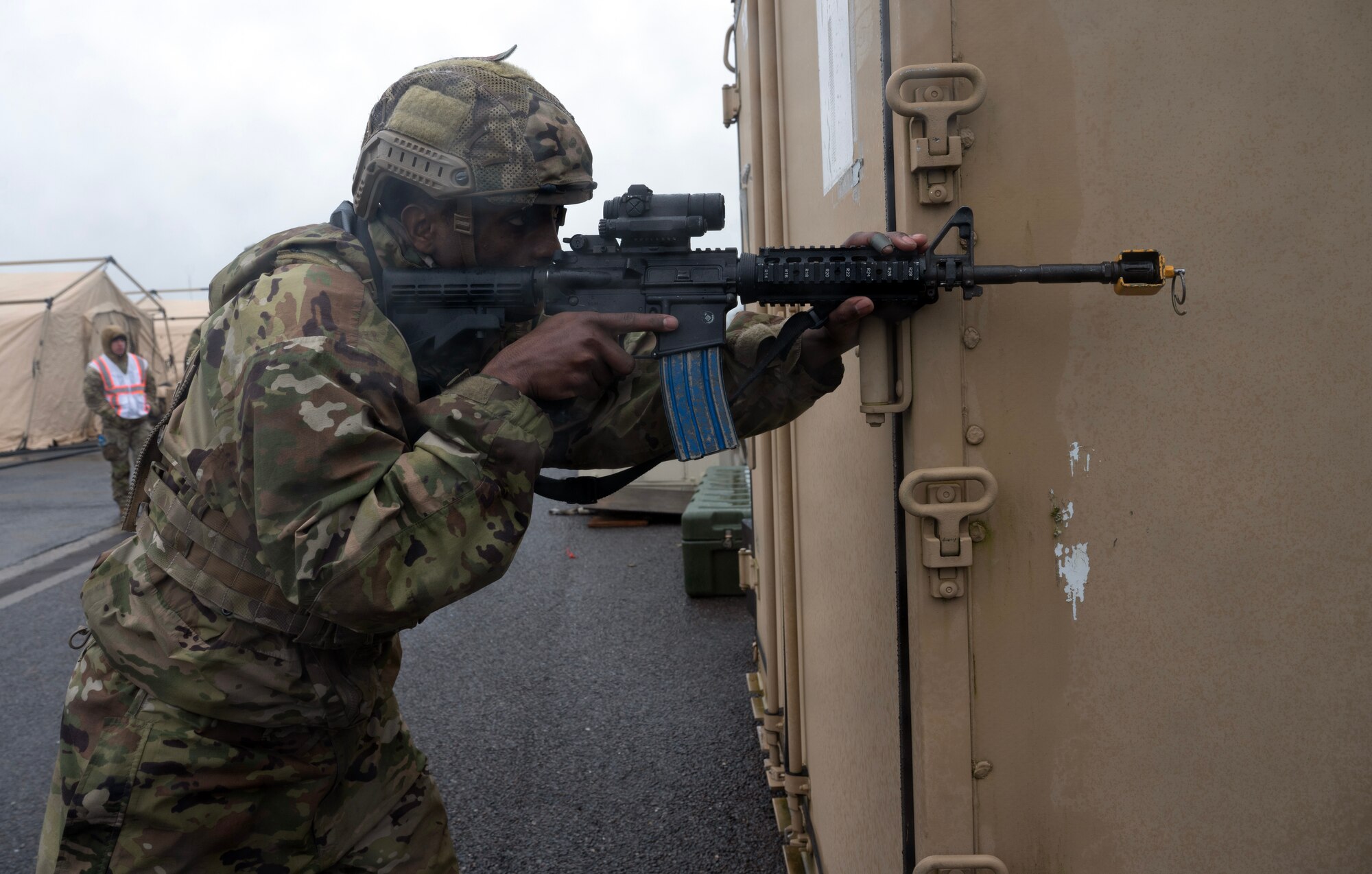 U.S. Air Force Airman returns fire during an exercise