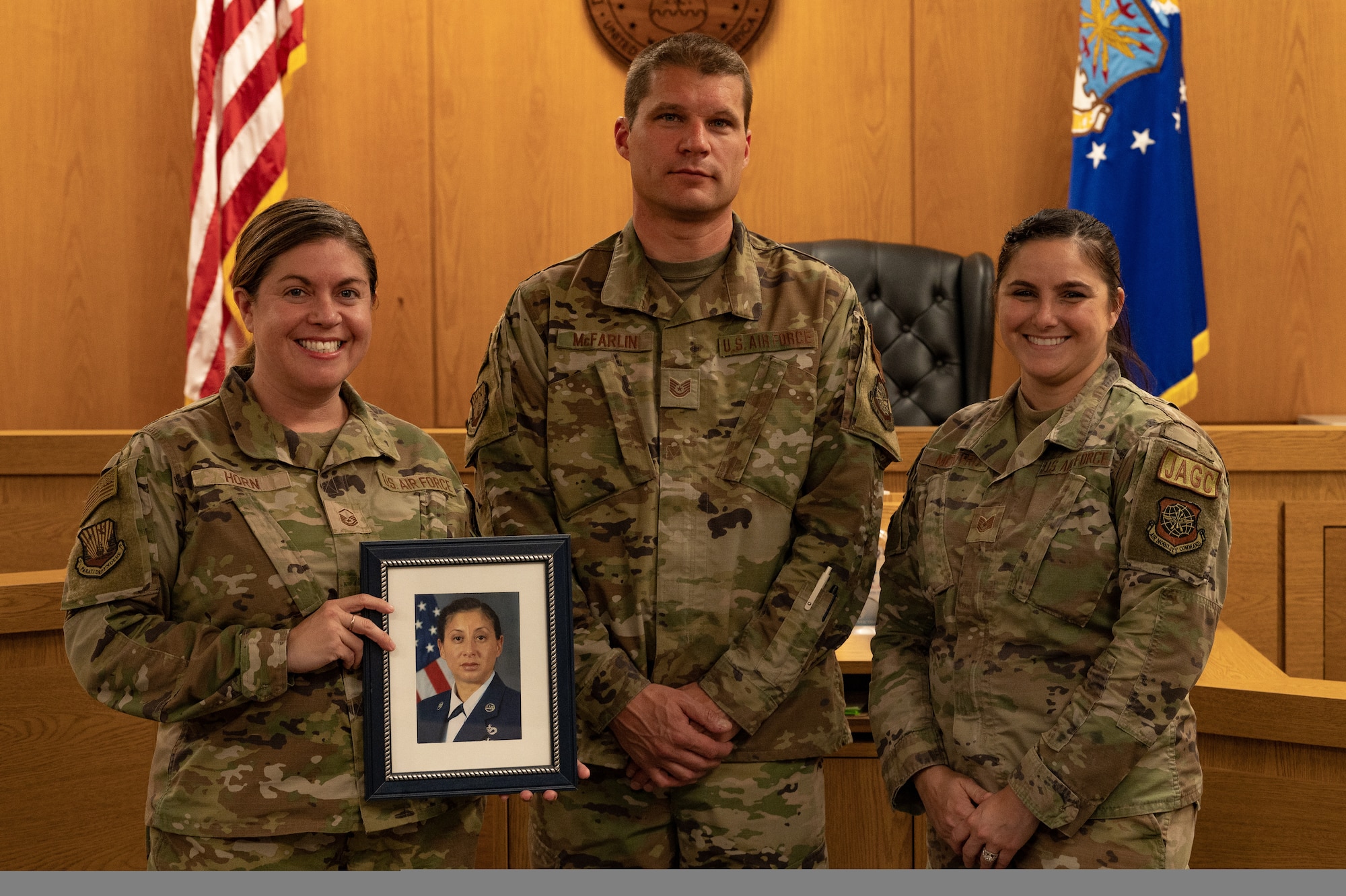 From left U.S. Air Force Master Sgt. April Horn, the 6 ARW law office superintendent, U.S. Air Force Technical Sgt. Shawn McFarlin, the non-commissioned officer in charge of 6 ARW legal team, and U.S. Air Force Technical Sgt. Lizandra Montero, 6 ARW Paralegal, pose for a photo at MacDill Air Force Base, Florida, Mar 3, 2023.