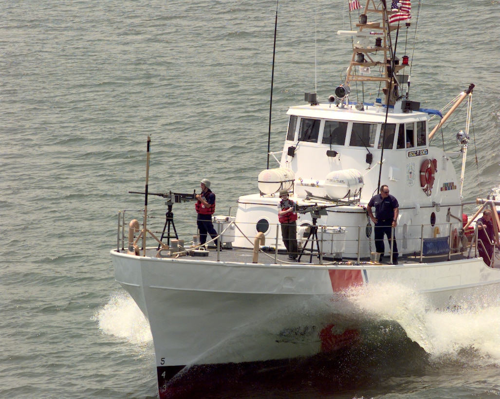 The CGC Point Bonita (WPB 82347), homeported in Norfolk, VA, takes part in a hostile party demonstration put on by the Coast Guard for Missions Day attendees.