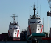 The Coast Guard cutter Dauntless (WMEC  624) and the Coast Guard Cutter Durable (WMEC 628) side by side in the dry dock at the Coast Guard Yard.