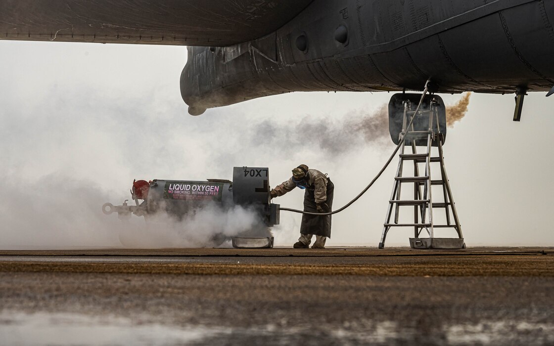 An airman assigned to the 23rd Aircraft Maintenance Unit performs an oxygen refill on a B52-H Stratofortress at Morón Air Base, Spain, Mar. 10, 2023. Strategic bomber missions enhance the readiness and training necessary to respond to any potential crisis or challenge across the globe. (U.S. Air Force by Airman 1st Class Alexander Nottingham)