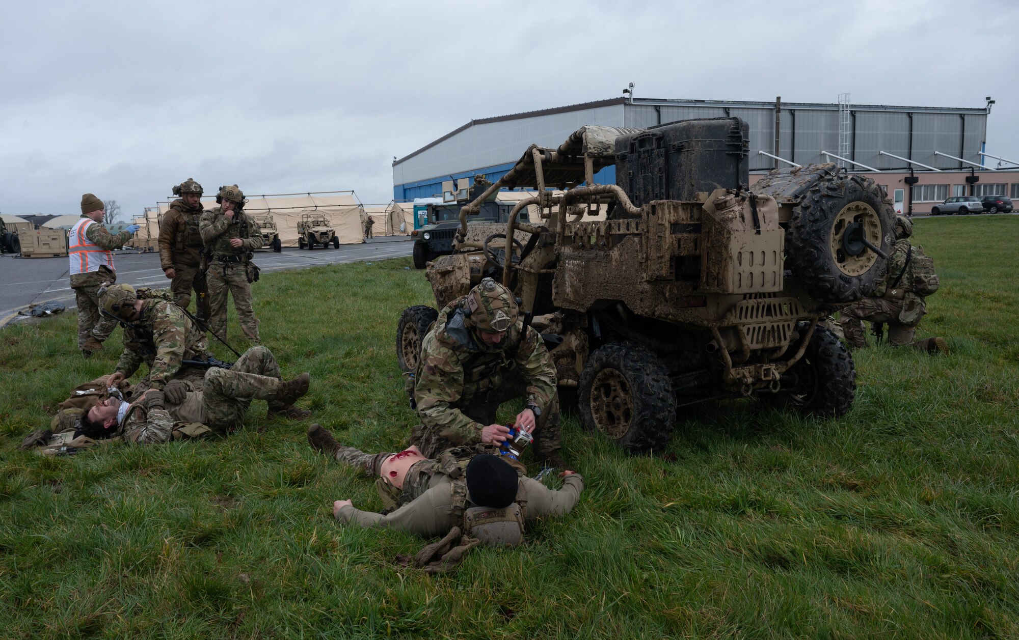 Members from the 435th Contingency Response Group respond to a scenario-based vehicle rollover accident during Exercise Agile Bison at Chièvres Air Base, Belgium, March 9, 2023.