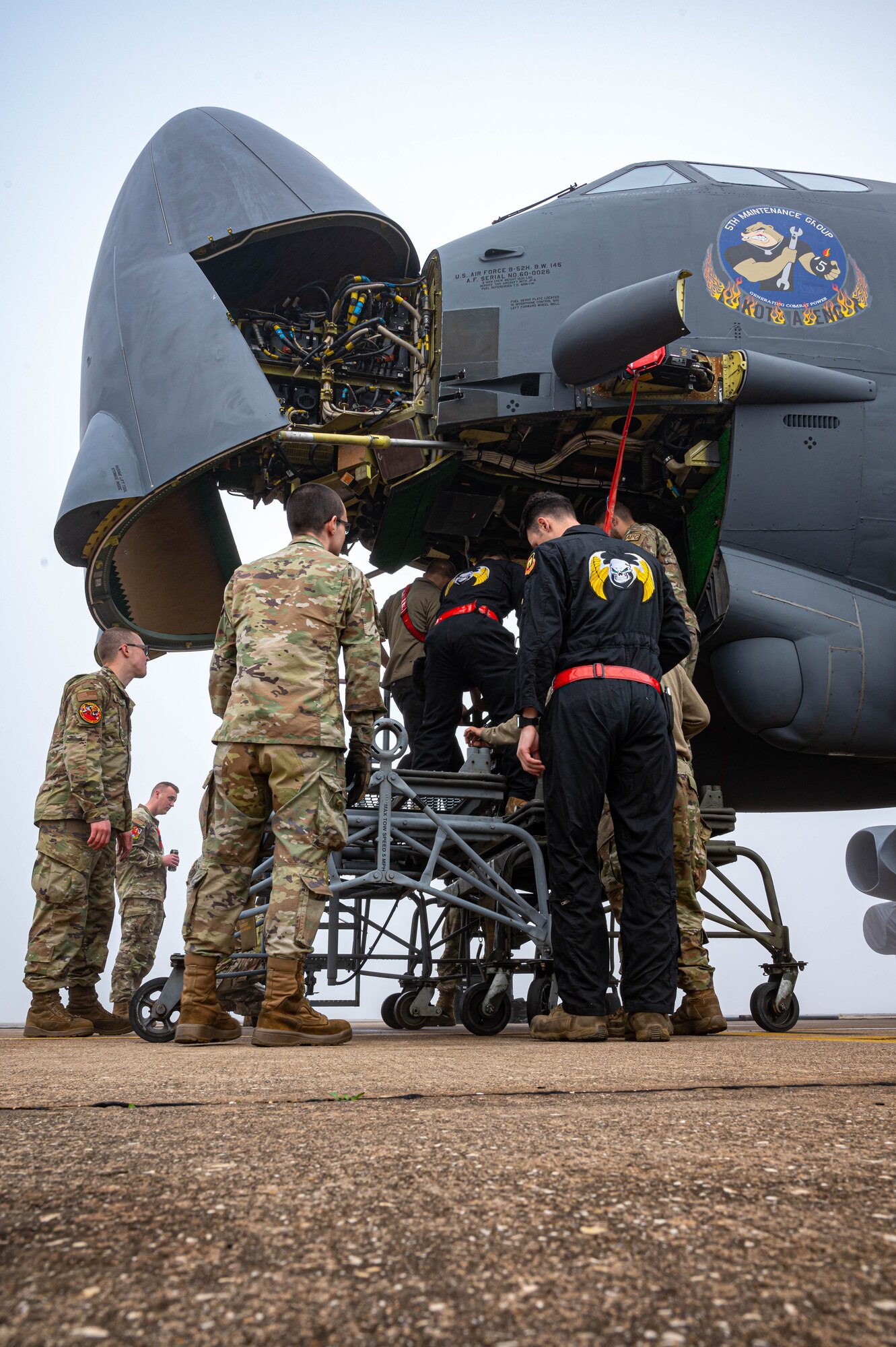 Members of the 23rd Aircraft Maintenance Unit perform a radar antenna swap on a B52-H Stratofortress at Morón Air Base, Spain, Mar. 10, 2023. The U.S. maintains a strong, credible strategic bomber force that enhances the security and stability of Allies and Partners. (U.S. Air Force by Airman 1st Class Alexander Nottingham)