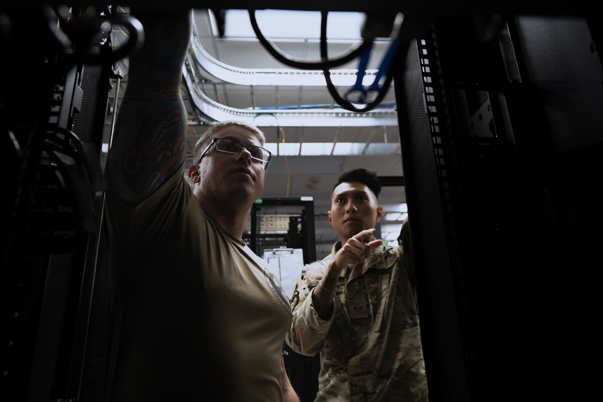 Network infrastructure technicians integrate and supervise network design, and configuration operations. (U.S. Air Force photo by Airman 1st Class Derrick Bole)