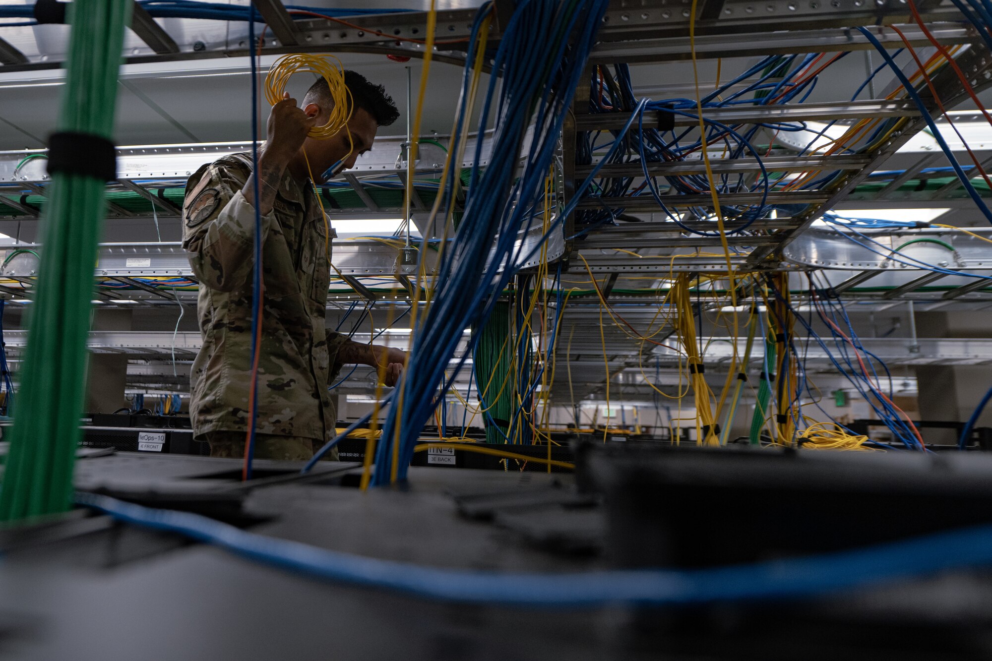 Network infrastructure technicians integrate and supervise network design, and configuration operations. (U.S. Air Force photo by Airman 1st Class Derrick Bole)