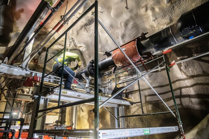 A Red Hill Bulk Fuel Storage Facility (RHBFSF) contractor prepares to make a repair on a fuel pipe, Mar. 6, 2023, in Halawa, Hawaii. Joint Task Force-Red Hill is currently in phase three of its five-phase defueling plan, where contractors and employees will complete repairs and upgrades to ensure a safe and expeditious defueling of the RHBFSF. (U.S. Marine Corps photo by Sgt. Sarah Stegall)